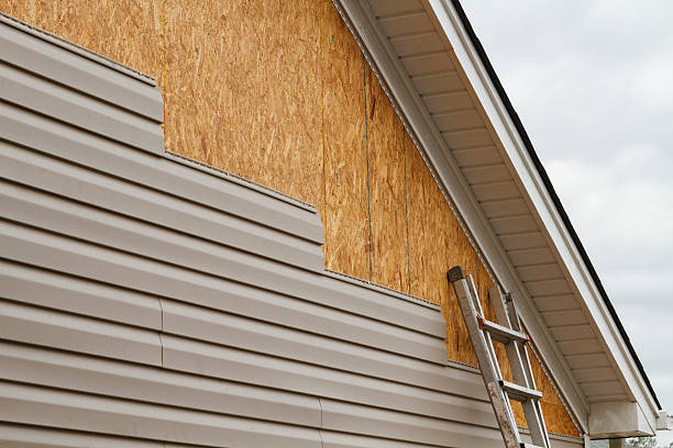 Professional Siding Contractor technician working in Millington, MD